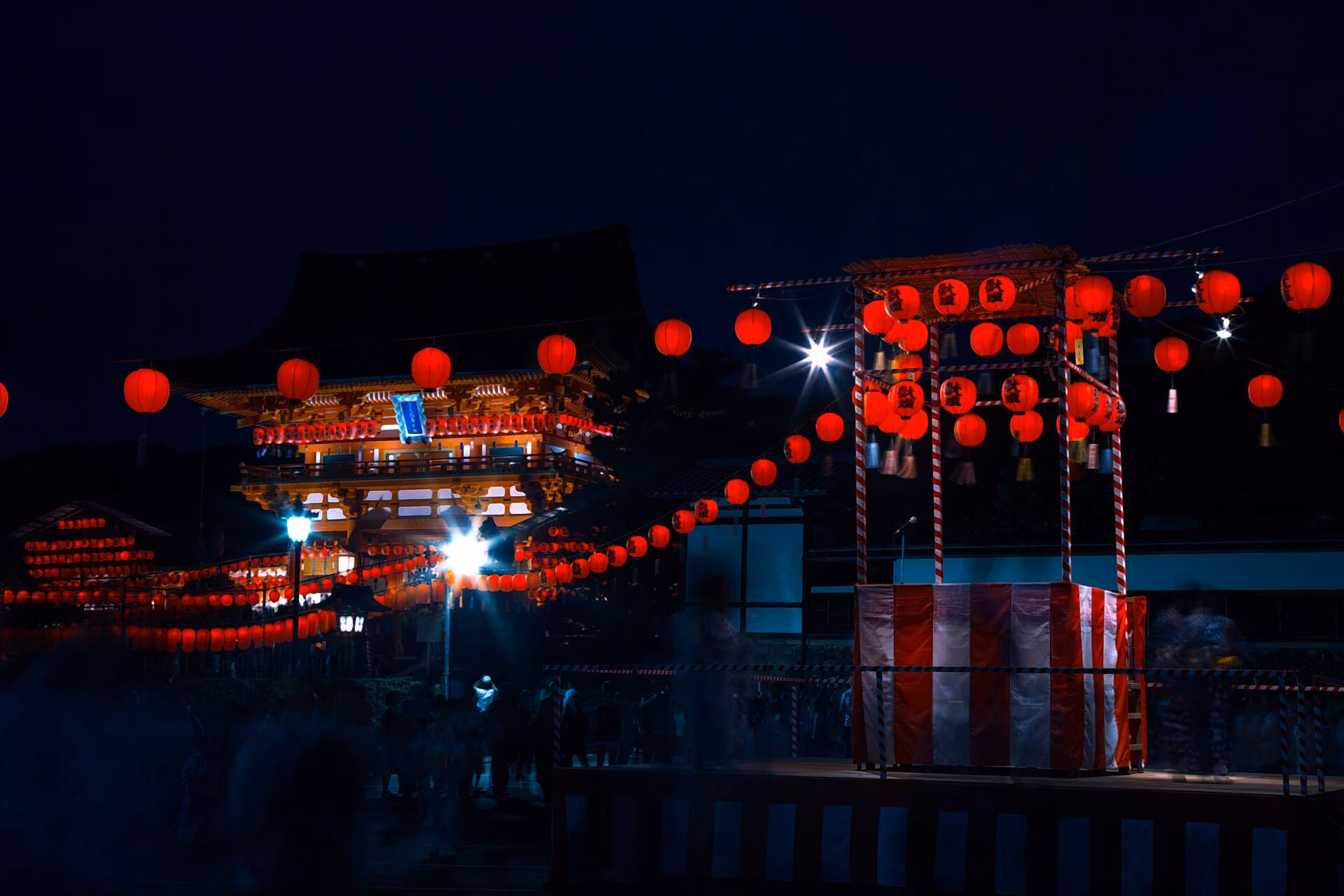 Fushimi Inari Taisha illuminated by lanterns during Motomiya-sai